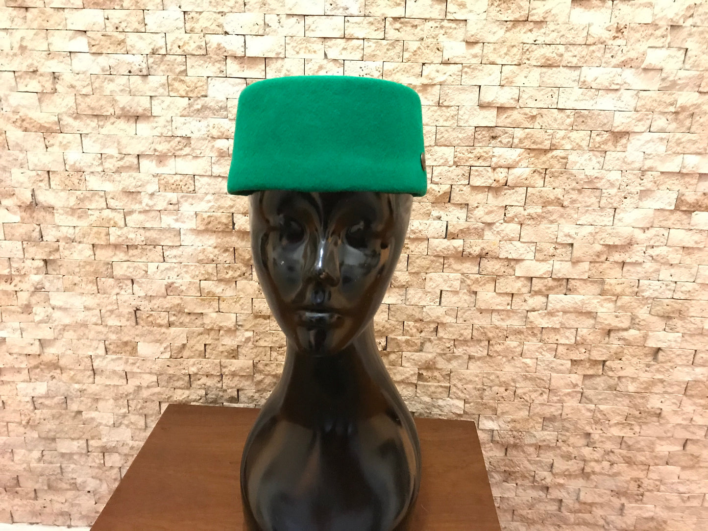 Green fez hat