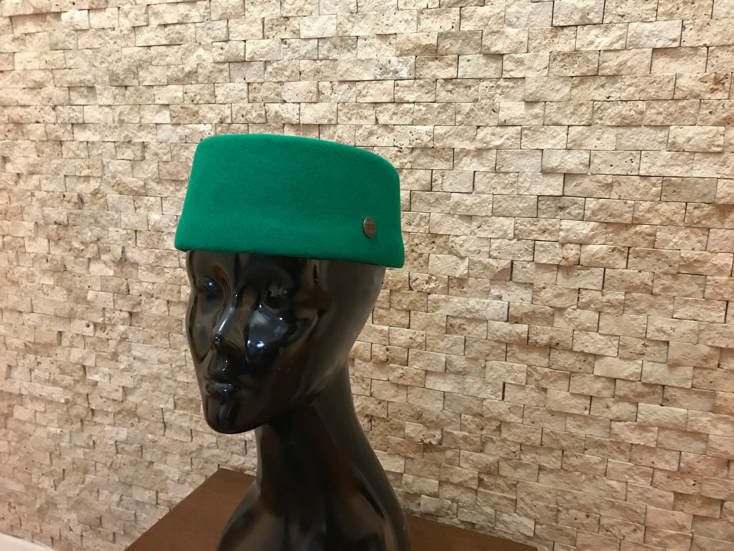 Green fez hat